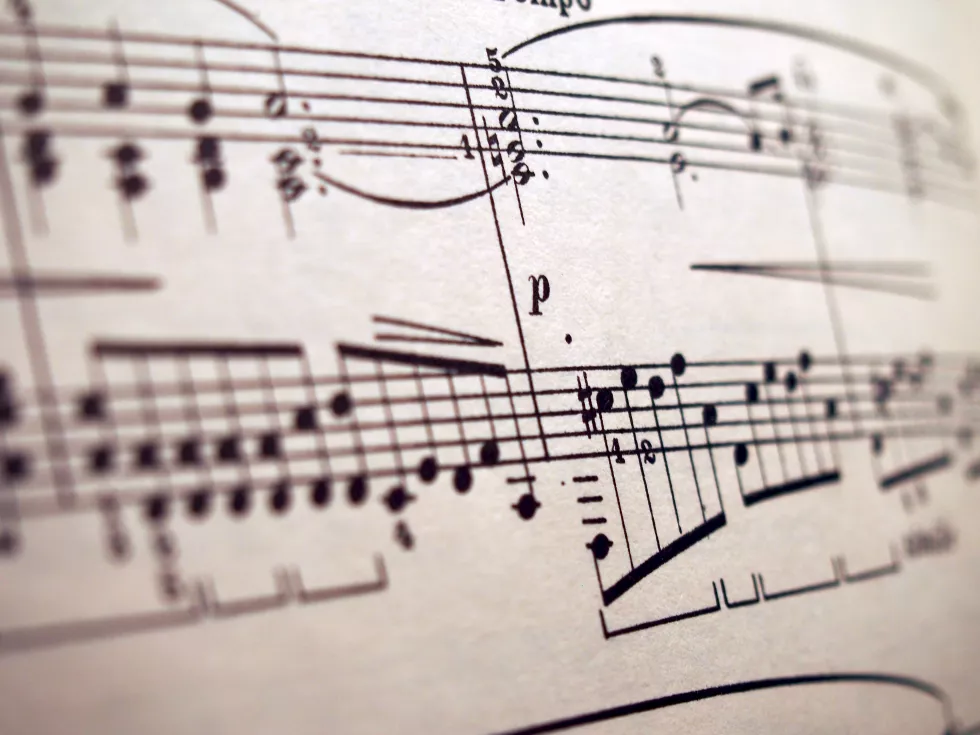 close-up-piano-keys-paper