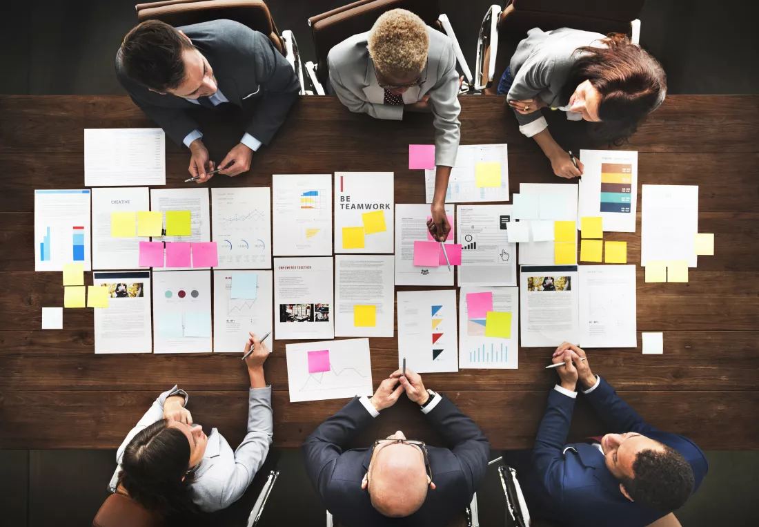 business-people-analyzing-statistics-financial-concept